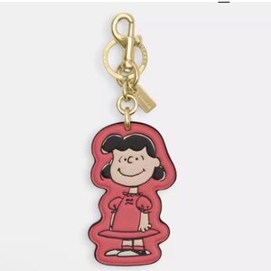 Coach x Peanuts 2025 Lucy Leather Bag Charm Keychain CBG58 Pink Anniversary